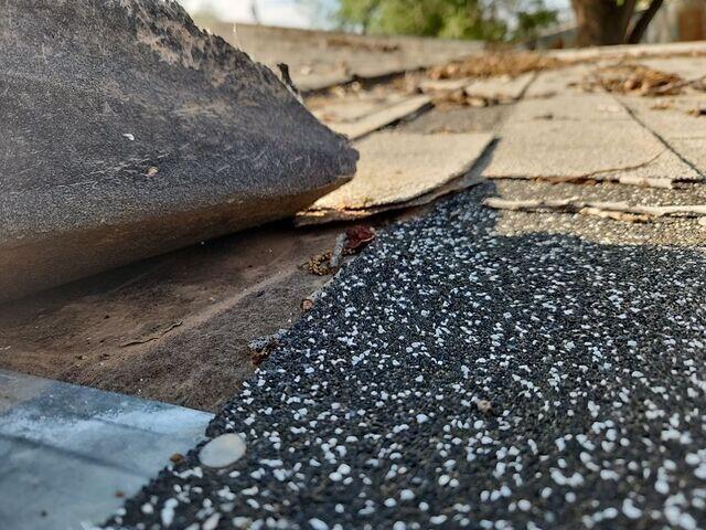 Shigles are damaged and lifting