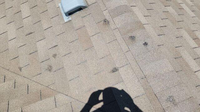 Hail damage to ashpalt shingles