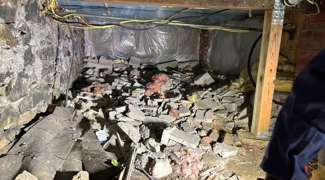 Debris found under crude crawlspace in Wilmington, DE