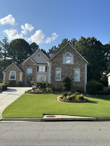 Front Angle With Stone added To Front Of House