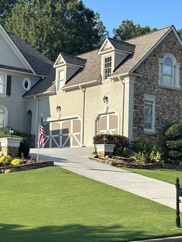 New Roof, New Garage Doors & 3rd Car Garage Oh My!