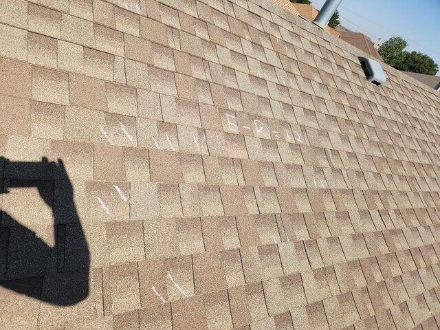 Hail damage to asphalt roof