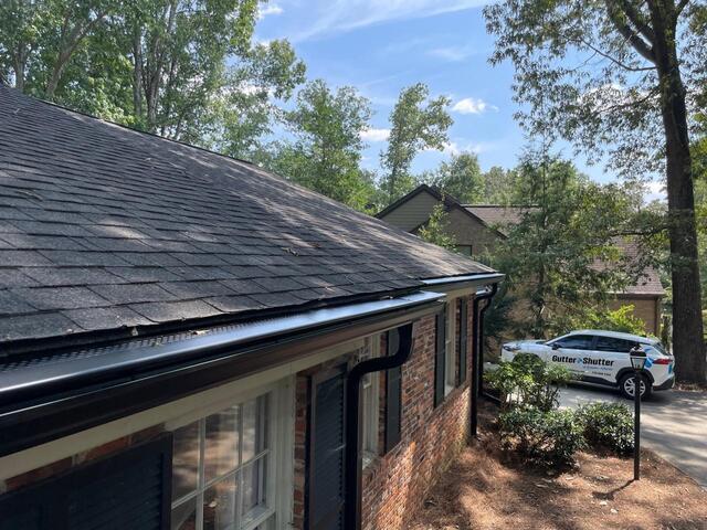 Front of home Gutter Shutter in Black