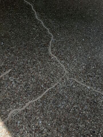 Cracked Aggregate Driveway in Hendersonville, TN