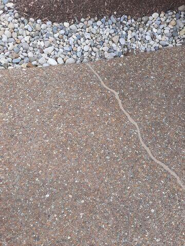 Cracked Aggregate Driveway in Hendersonville, TN