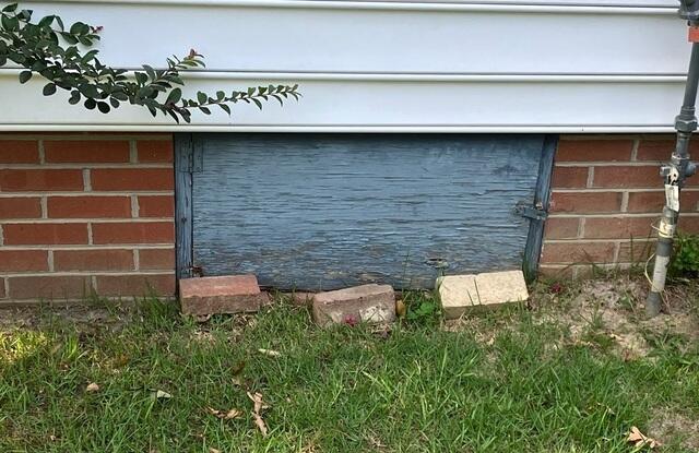 Wood Rotted Crawl Space Door
