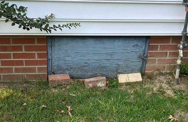 Wood Rotted Crawl Space Door