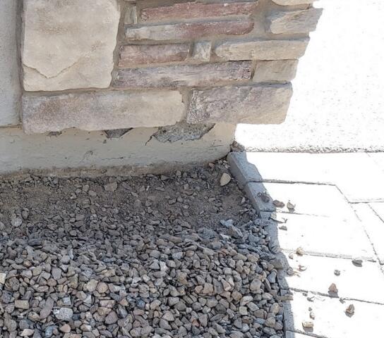 Symptoms of Corrosion Problems in a Concrete Stem Wall: Flaking Paint in Gilbert, AZ