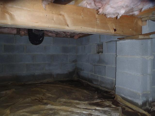 Moisture and water found in dirt crawlspaces cause more problems than you may know. Moisture causes wood rot and mold, and also attracts bugs such as termites. Crawlspace encapsulation can prevent the water from damaging this dirt crawlspace! Adding a sump pump, vapor barrier, and a dehumidifier will keep your home free of bugs, dust, water damage, and mold. This will also help lower energy costs by keeping cold air from entering through floors in the winter and keep hot and humid air from entering in the summer.