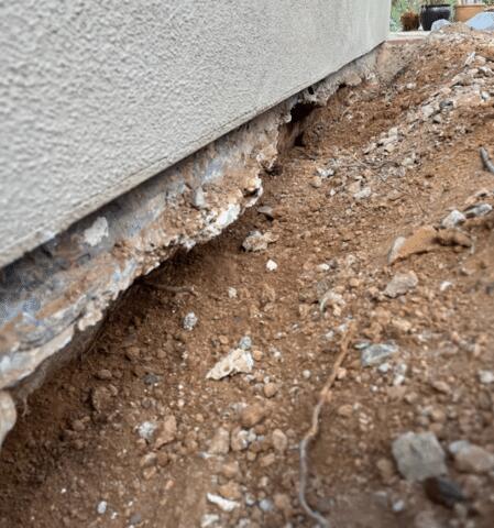 Signs of Corrosion in a Stem Wall: Spalling Concrete in Carefree, AZ