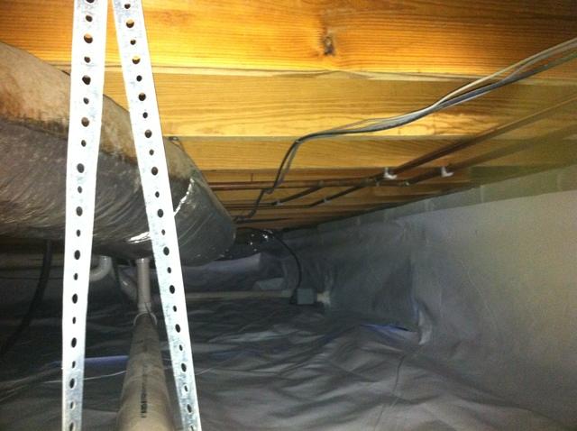 CleanSpace helped seal this musty crawlspace into a useable and energy-friendly space!
