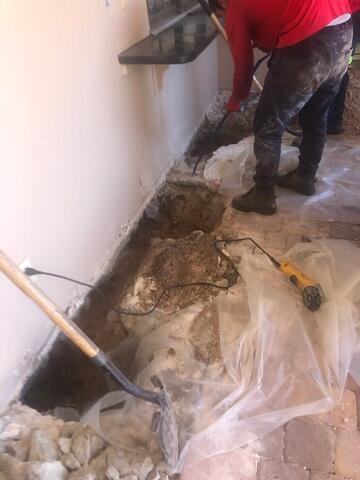 Soil Excavation for Helical Pier Installation