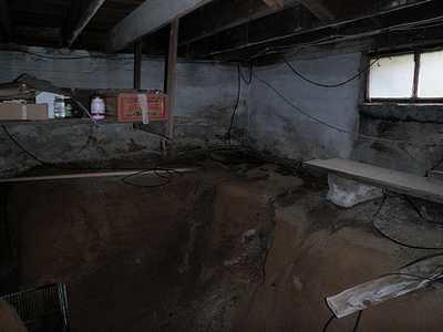 Crumbling Dirt Walls of Maryland Crawl Space