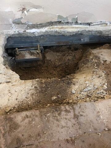 Complete Helical Pier Installation