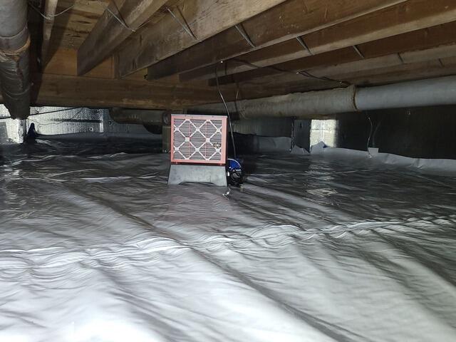 The full crawlspace is fully encapsulated with our Sedona dehumidifier.