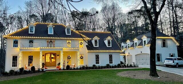 Lights added to roofline and porch beams