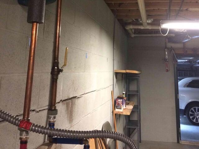 The cracks in the basement wall raised the homeowner's worries!