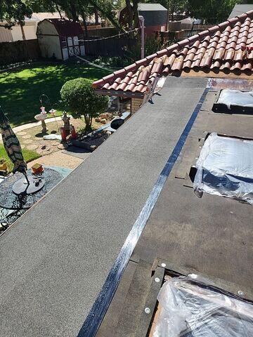 First layer of torched down bitumen