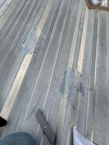 Patching of punctures in metal roof.
