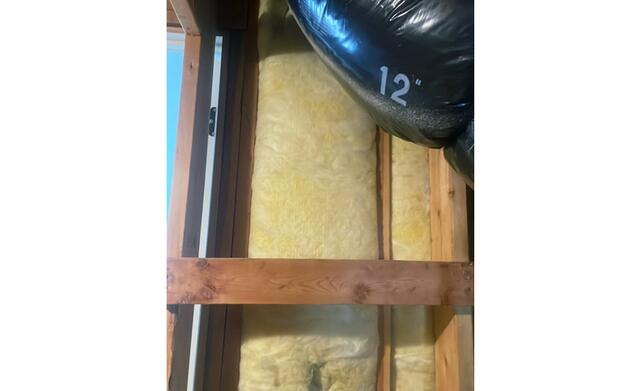 Exposed Fiberglass Insulation