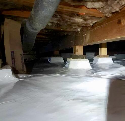 Crawlspace encapsulation to seal off the space from external moisture.