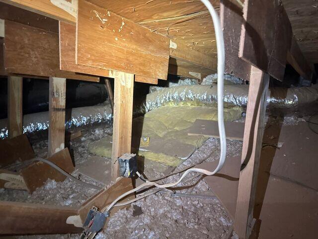 Attic Floor with exposed areas.