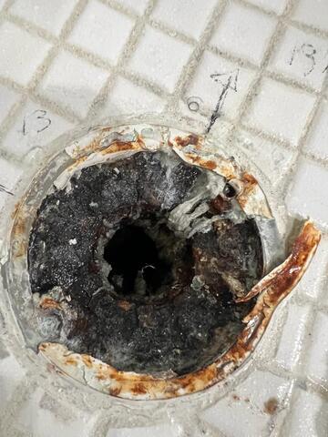 corroded drain