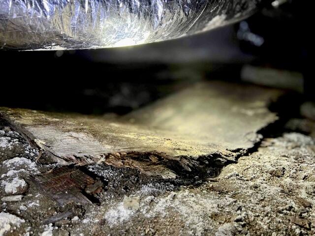 Moisture begins to break down the wood structure in Pebble Beach, CA, home crawlspace