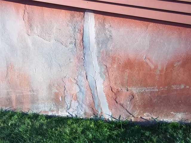 The foundation cracks in this home were severe, and despite attempts to repair them, more appeared.