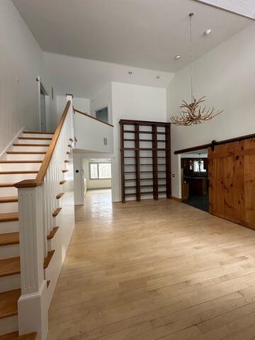 Foyer/common area with staircase