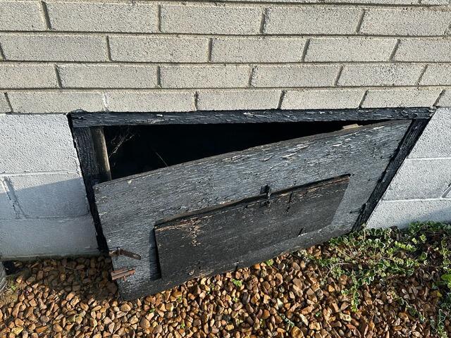 Old Crawl Space Door