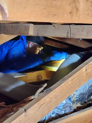 Crew Member Jesse M. Cleaning out process.