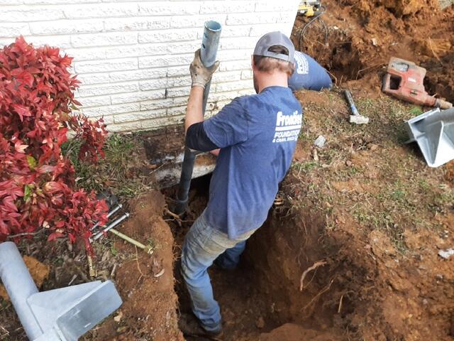Digging out area where the Pier will be Installed