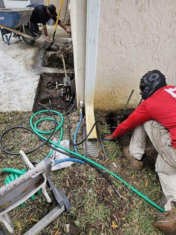 Stabilizing Settling Foundation with Helical Pier System