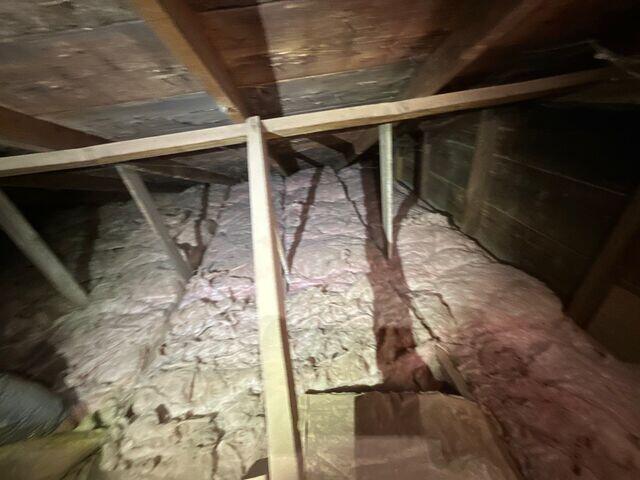 Attic with roll Batt insulation