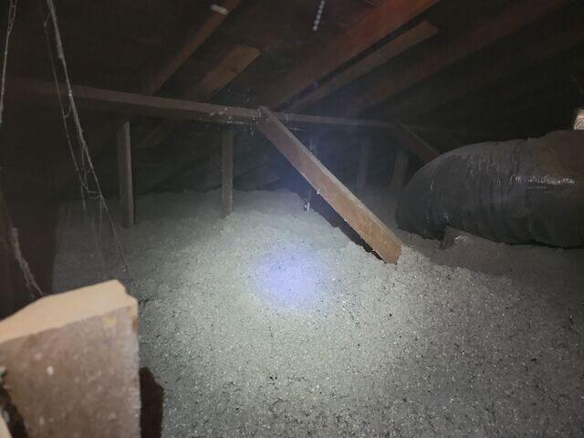 The progress of blown in insulation.