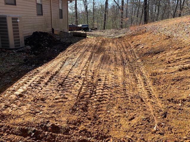 The backyard after our crew was done installing the wall plates.