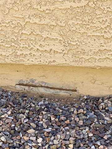 Signs of Corrosion in a Stem Wall: Exposed Rebar in Sahuarita, Arizona