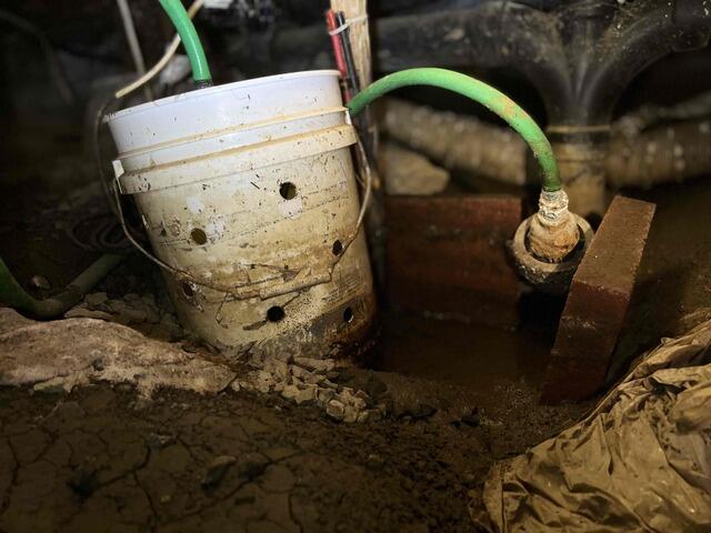 Muddy mess in Moss Beach, California, home crawl space