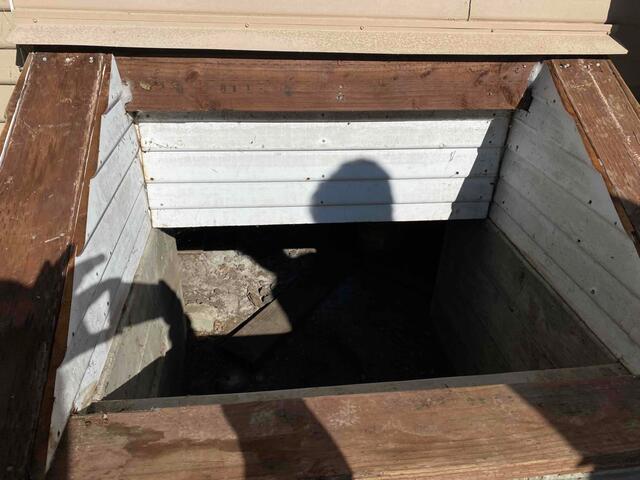 Damaged crawlspace entry in Pescadero, CA