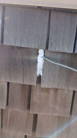 Adding Silicone on wires coming out of wall.