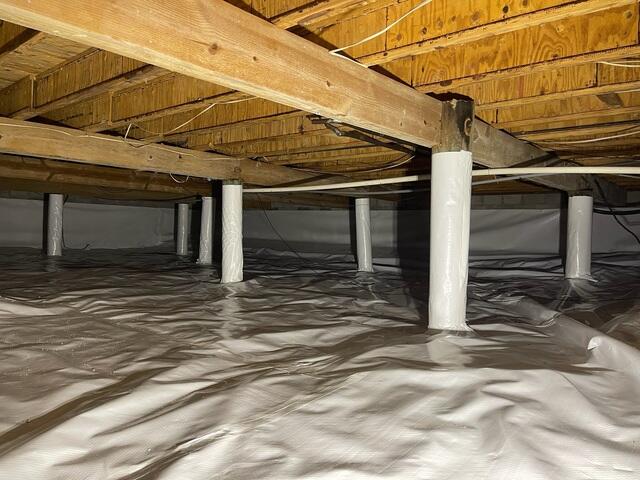 Wrapping Piers with CleanSpace Vapor Barrier