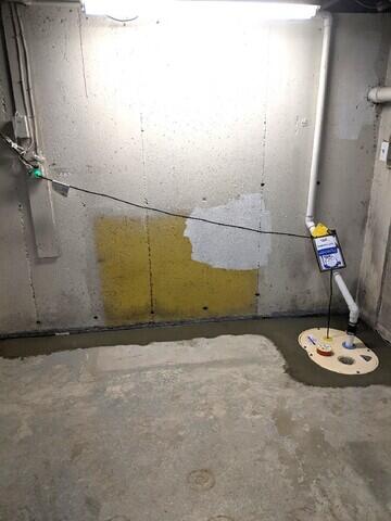 TripleSafe Sump Pump Connected to WaterGuard Drainage System