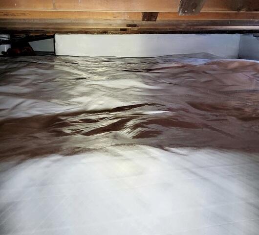 Sealing the Deal: A Vapor Barrier Keeps Moisture Out of Dreamhome Crawlspace