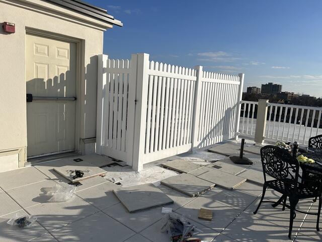 Vinyl Fence installation on top of Condo Arlington Virginia