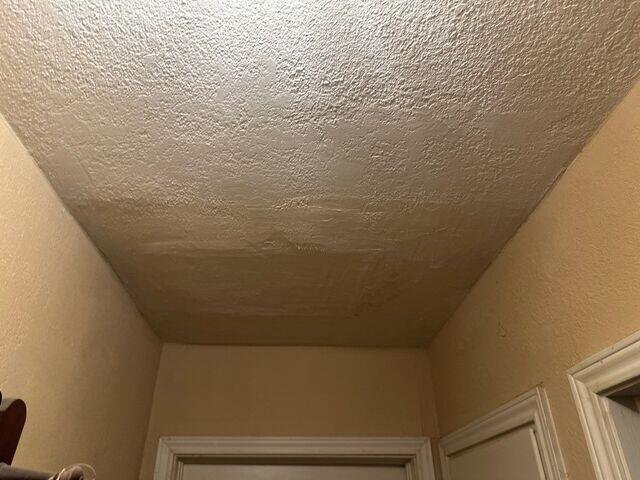 Water damage in the hall way ceiling.