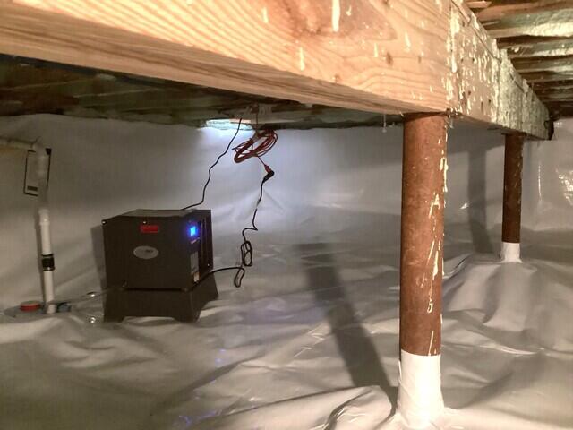 SaniDry Sedona Dehumidifier Surrounded By CleanSpace Vapor Barrier.