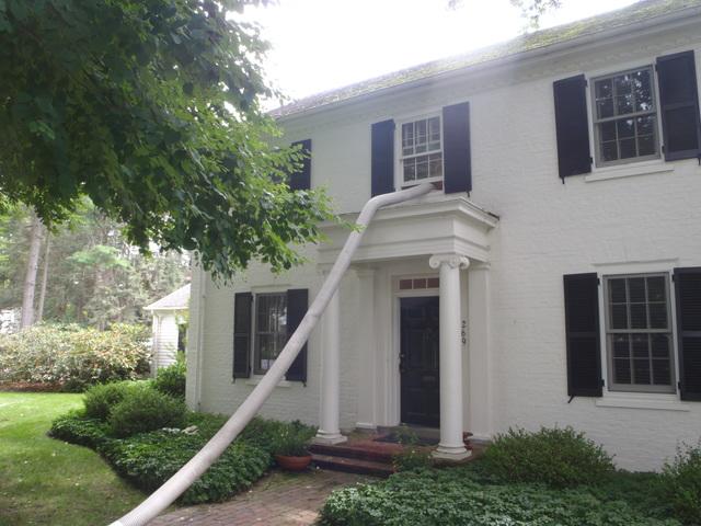 <p>This photo captures another angle of the <a href="http://www.delmarvadrenergysaver.com/insulation/cellulose-insulation.html">TruSoft Cellulose</a> Insulation being installed through the tube into the attic.&nbsp;</p>