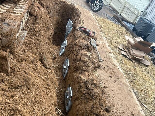 A close-up of the trench we dug with six geo locks installed.