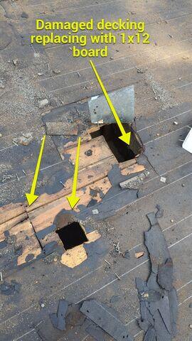 Exposing damaged decking boards.